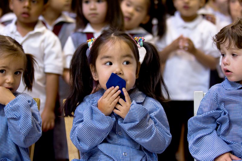Children learning in a Montessori classroom at Casa dei Bambini