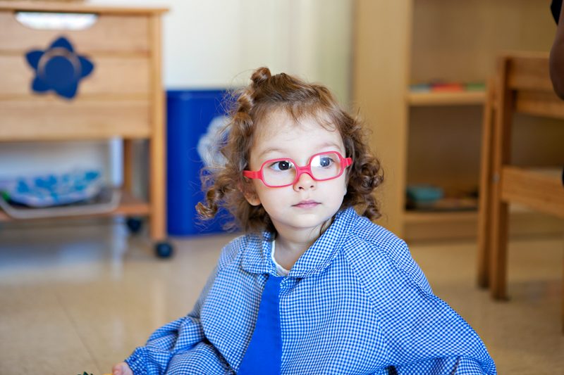 Children learning in a Montessori classroom at Casa dei Bambini