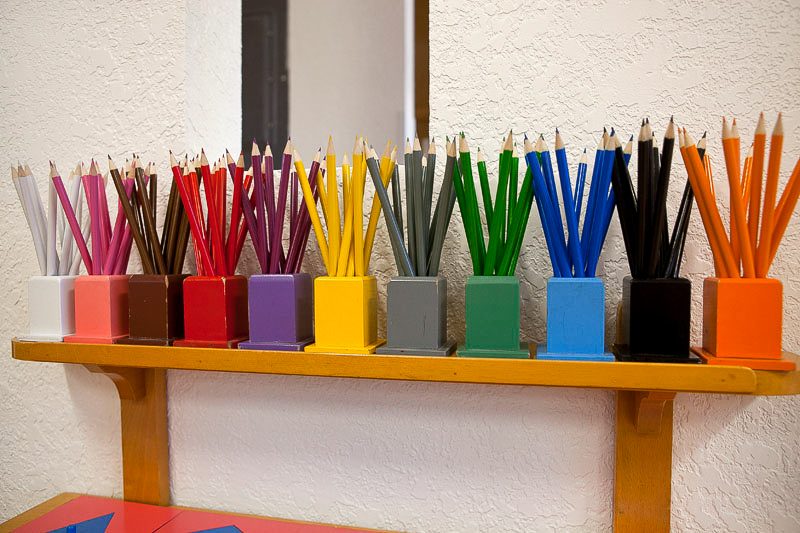 Children learning in a Montessori classroom at Casa dei Bambini